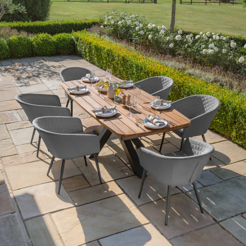 Jakarta Teak Oval Dining Table With Ambition Dining Chairs - Flanelle